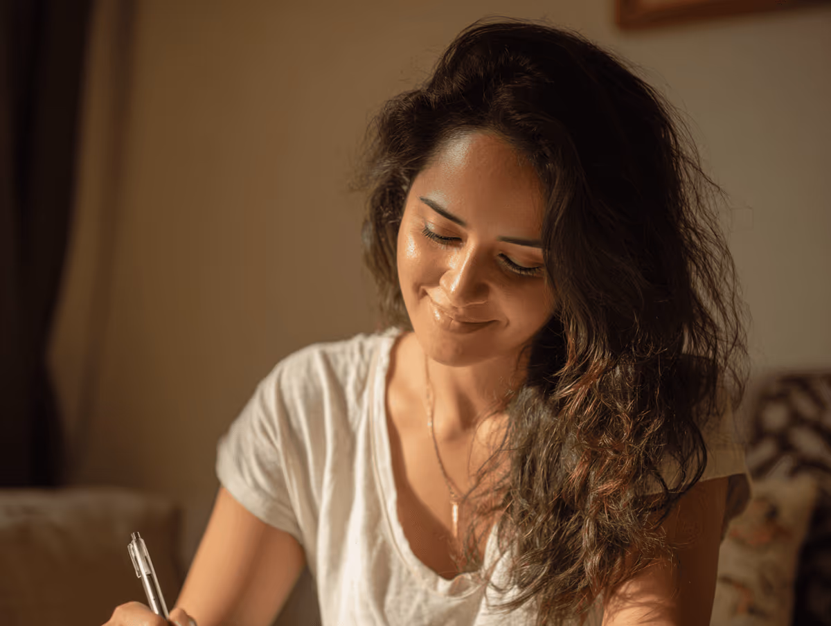 A woman setting up her BP Check-Up at home
